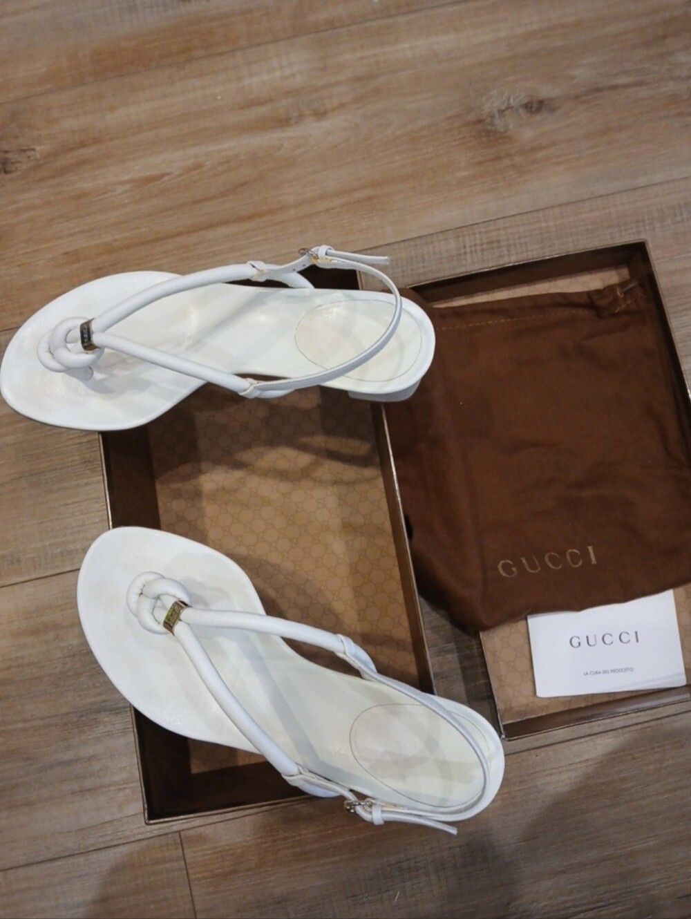 Gucci White Leather Strappy Thong Sandals with Gold Accent
